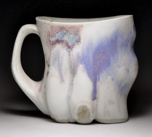Altered mug, Coleman Porcelain, fired in reduction to cone 10, 2024.