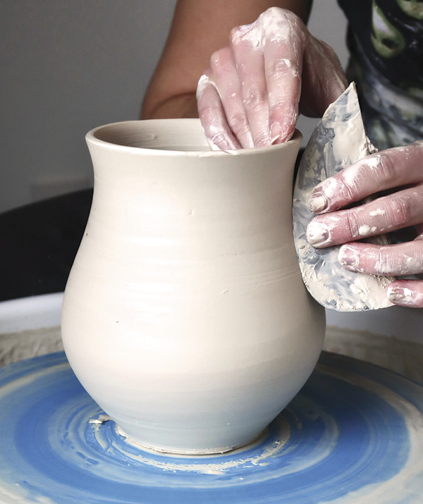 2 For pitcher forms, throw a cylinder and flare its base.