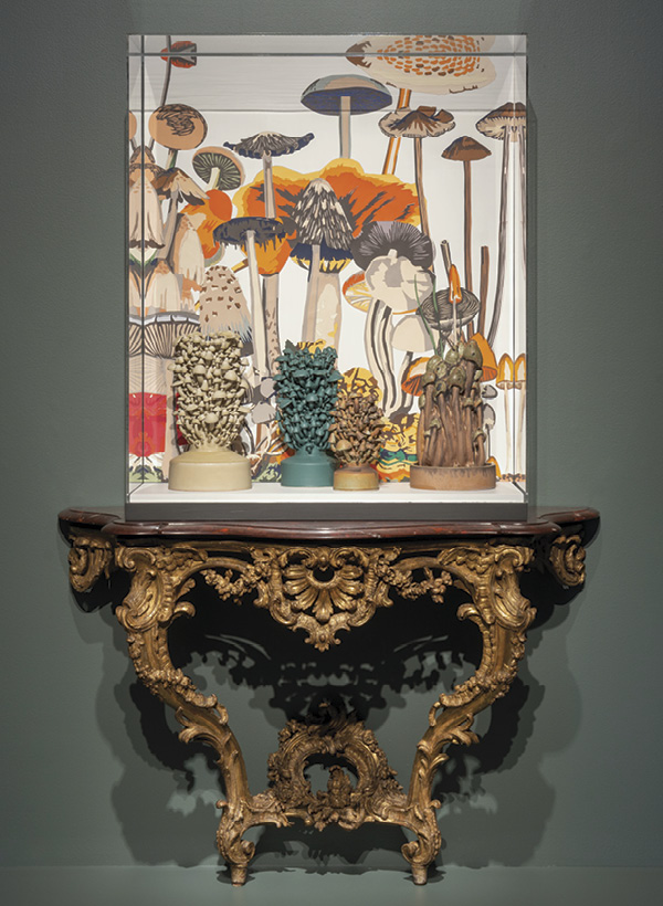 3 Consolarium, 3 ft. 9 in. (1.2 m) in height, porcelain, fired to cone 8 in an electric kiln, cut paper, wood, and circa 1740 console table (collection of Cincinnati Art Museum), 2021. Photo: Rob Deslongchamps for the Cincinnati Art Museum.