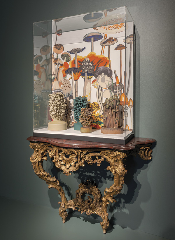 4 Consolarium, 3 ft. 9 in. (1.2 m) in height, porcelain, fired to cone 8 in an electric kiln, cut paper, wood, and circa 1740 console table (collection of Cincinnati Art Museum), 2021. Photo: Rob Deslongchamps for the Cincinnati Art Museum.