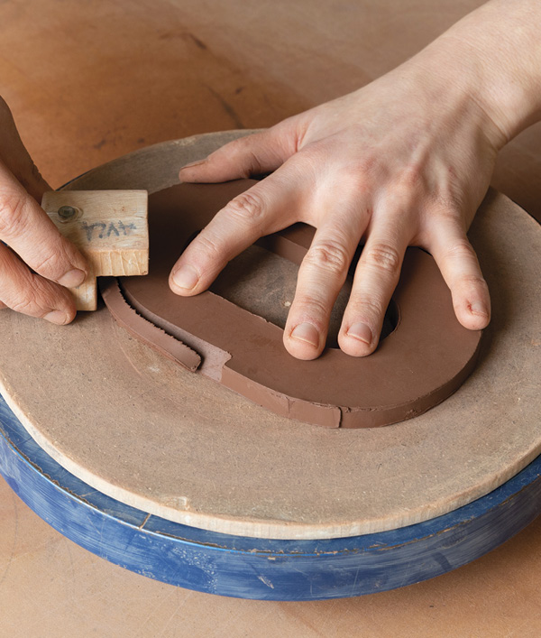 2 After cutting the pieces out, bevel the outer edge of the base and butter plate at a 45° angle.