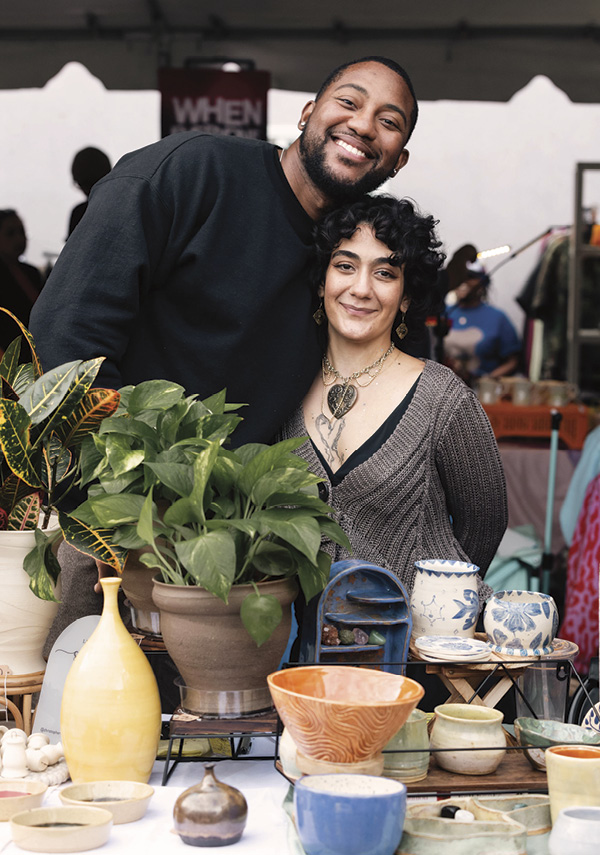 2 Studio members at the annual Holiday Market.